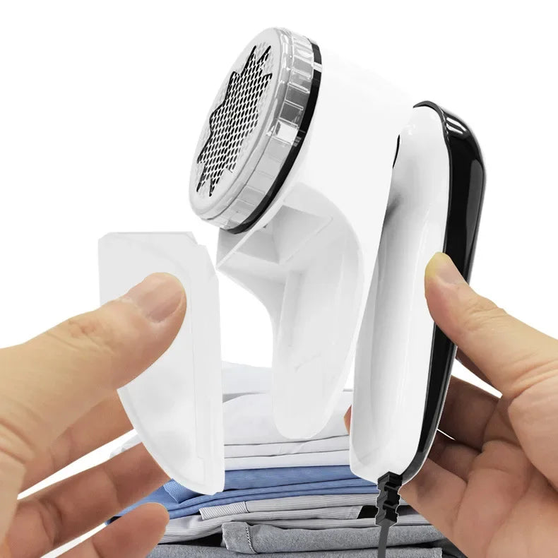 Tidesmit Zai Xiao electric fabric shaver detail view showing lint removal brush and replaceable blade mechanism