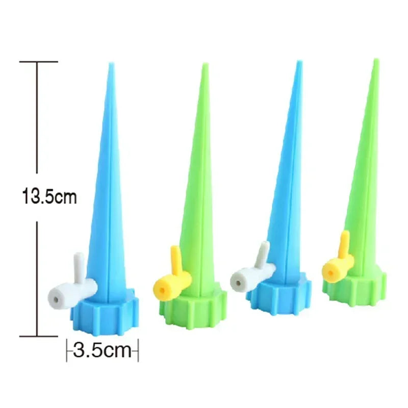 Adjustable drip irrigation stakes in blue and green, with outlet caps; 13.5 cm