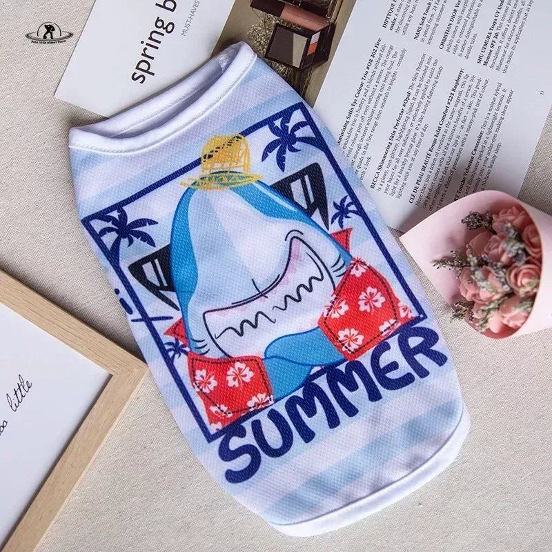 Cute summer dog vest shirt with cartoon shark print for small dogs, perfect breathable apparel for pets.