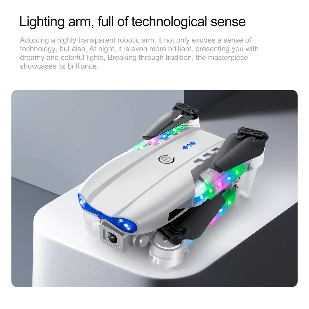 Foldable white camera drone with LED-illuminated transparent arms and black propellers for aerial photography.