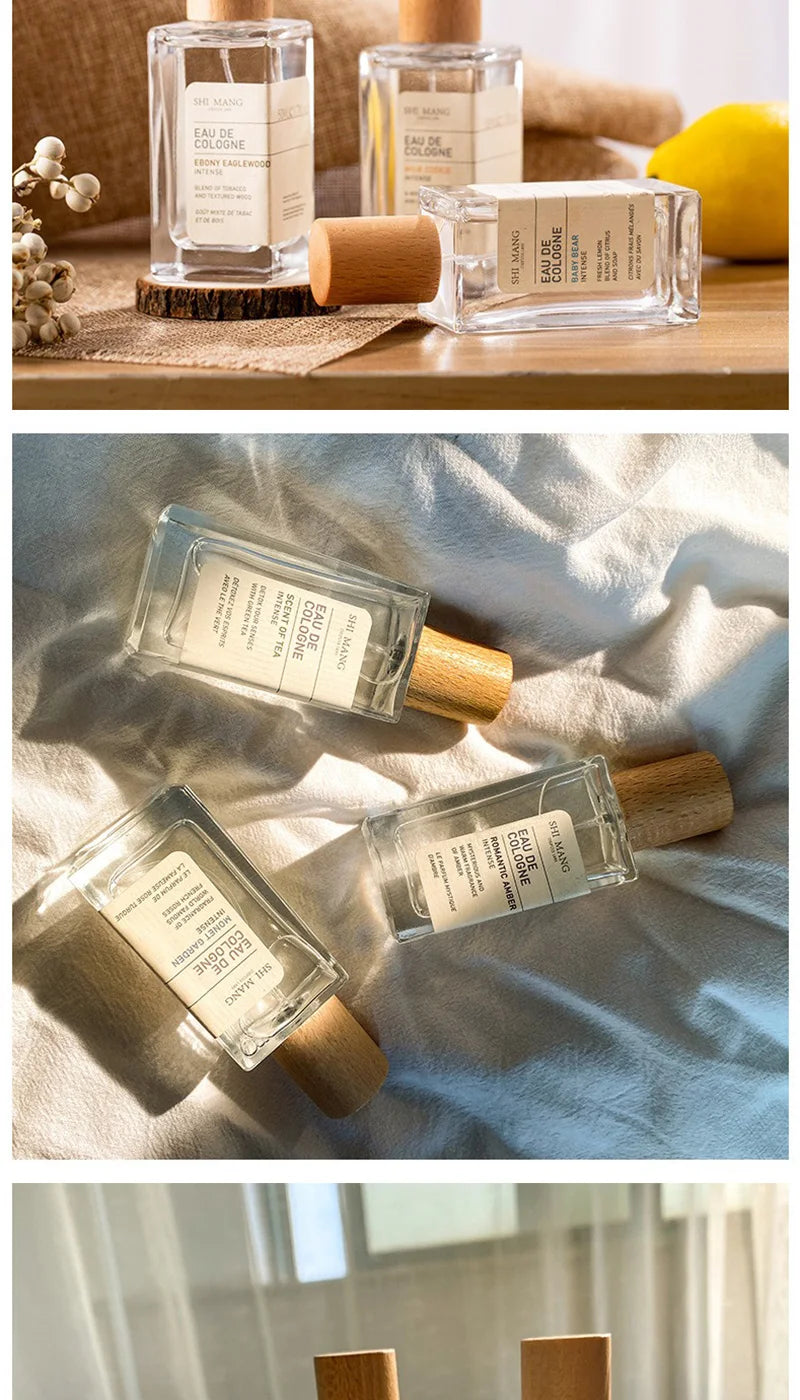 Shi Mang EDP perfume collection, woody & fruity tea scents in minimalist rectangular glass bottles with wood caps.