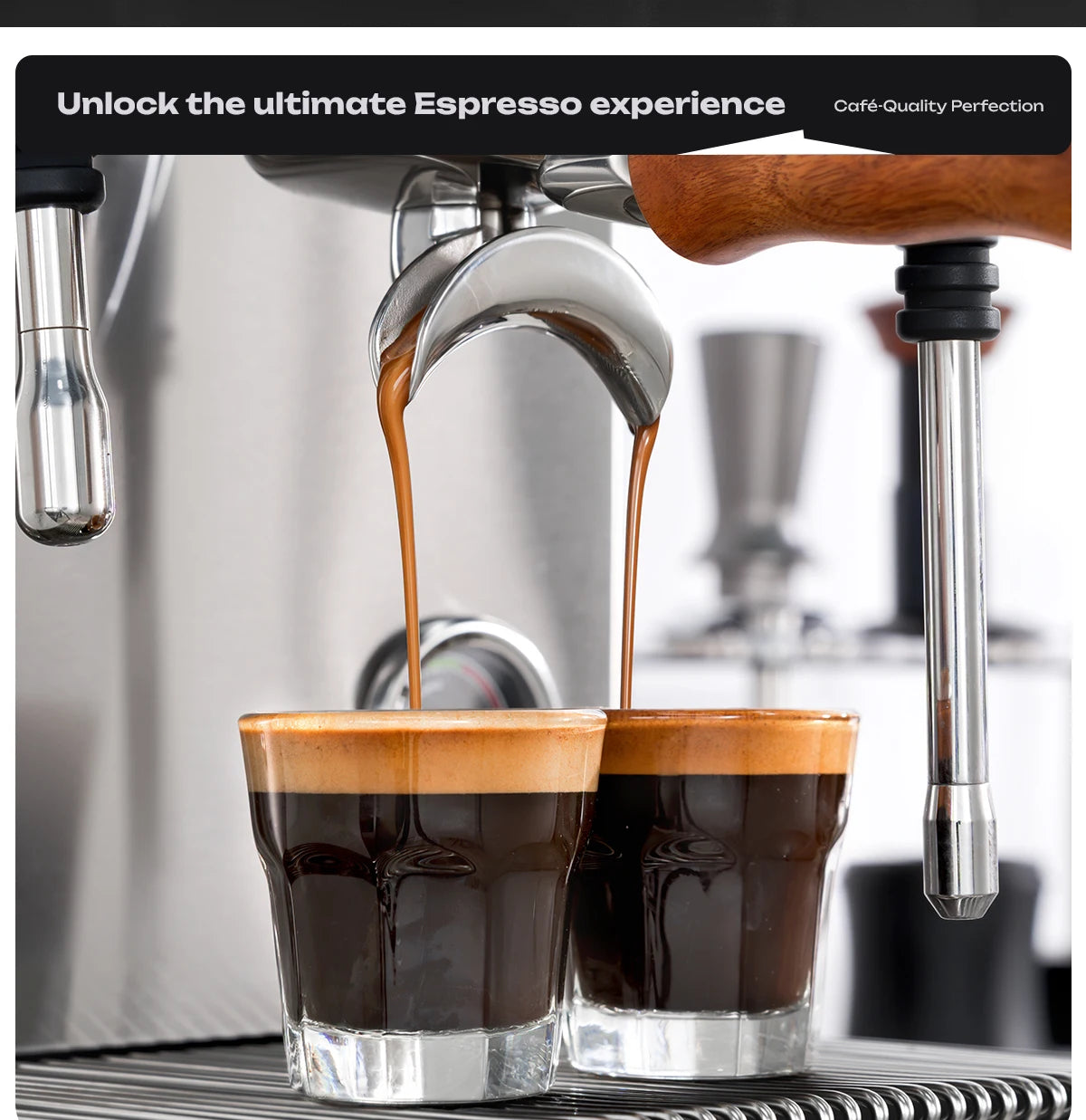 Stainless steel espresso machine with wood handle pouring fresh espresso shots into two glass cups.
