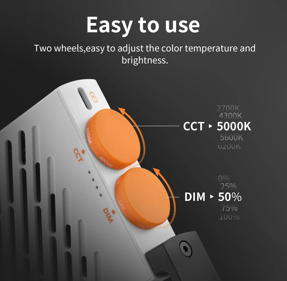 White portable LED light featuring two orange control wheels for adjusting color temperature and brightness levels.