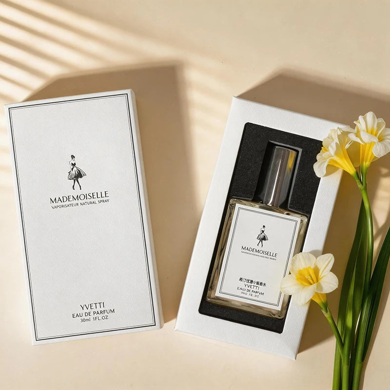 Yvetti Mademoiselle EDP: Floral fruity women’s perfume in a rectangular glass bottle. Elegant light, fresh daily scent.