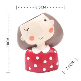 Bear-face succulent planter with red polka-dot shirt and circular pot opening