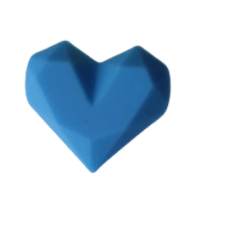Blue heart silicone dust plug for Tamagotchi Uni, perfect for protecting your electronic pet port from dirt.