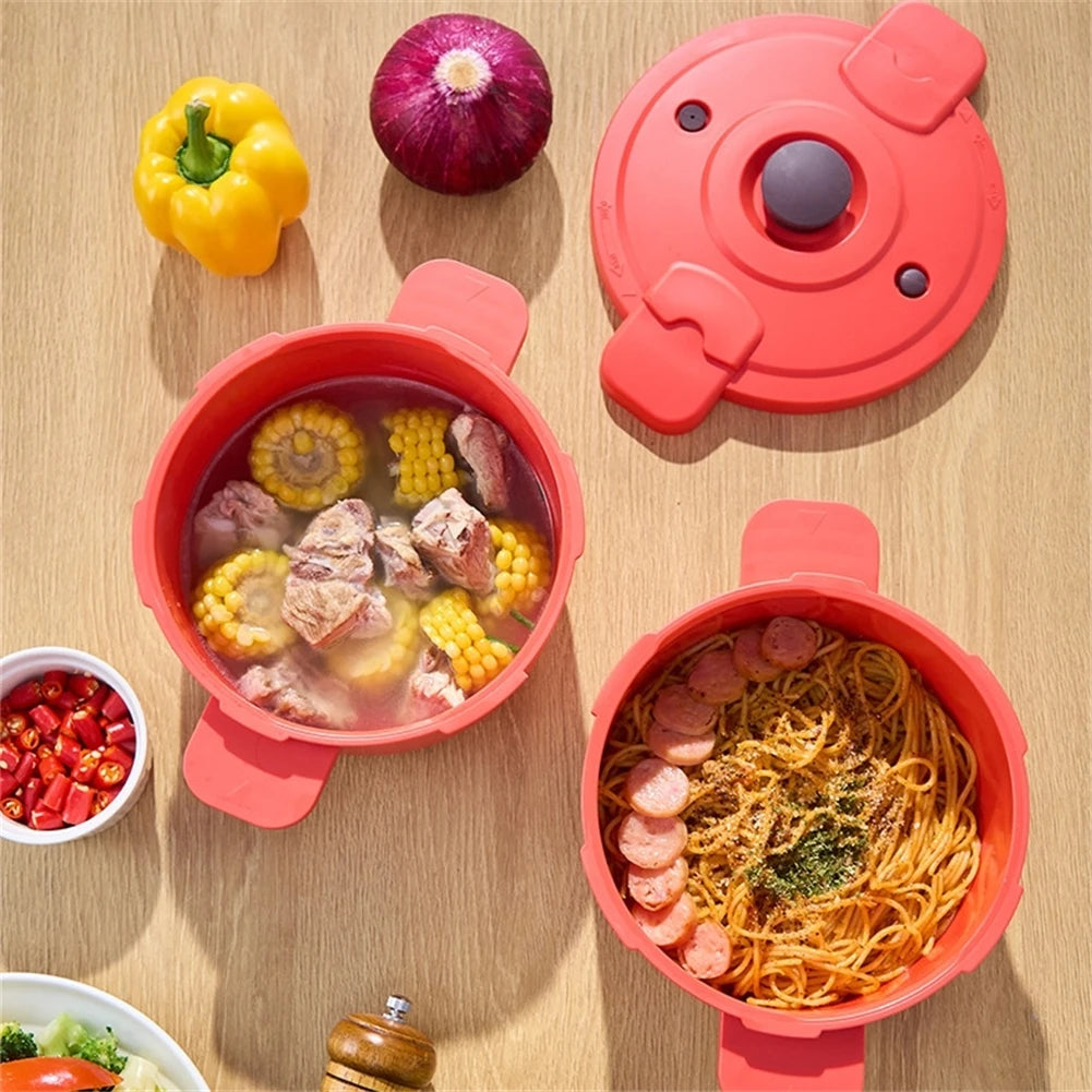 Red microwave cooker pots open, showing stew and noodles with vegetables inside