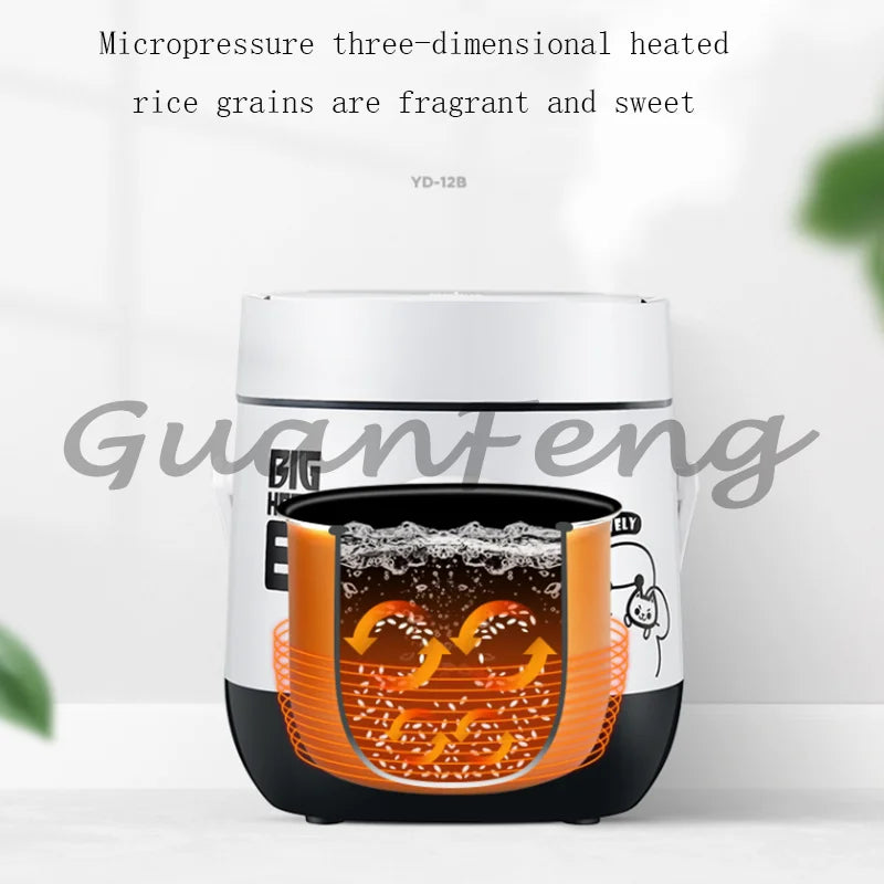White mini rice cooker with lid open, showing bubbling cooking pot with rice