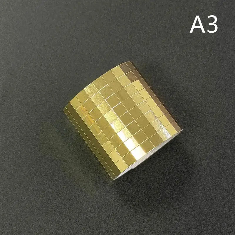 Self-adhesive mosaic glass tape swatch in gold mirror tiles with reflective grid