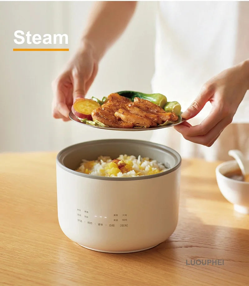 Smart white rice cooker pot with lid open while serving meat and rice to a plate