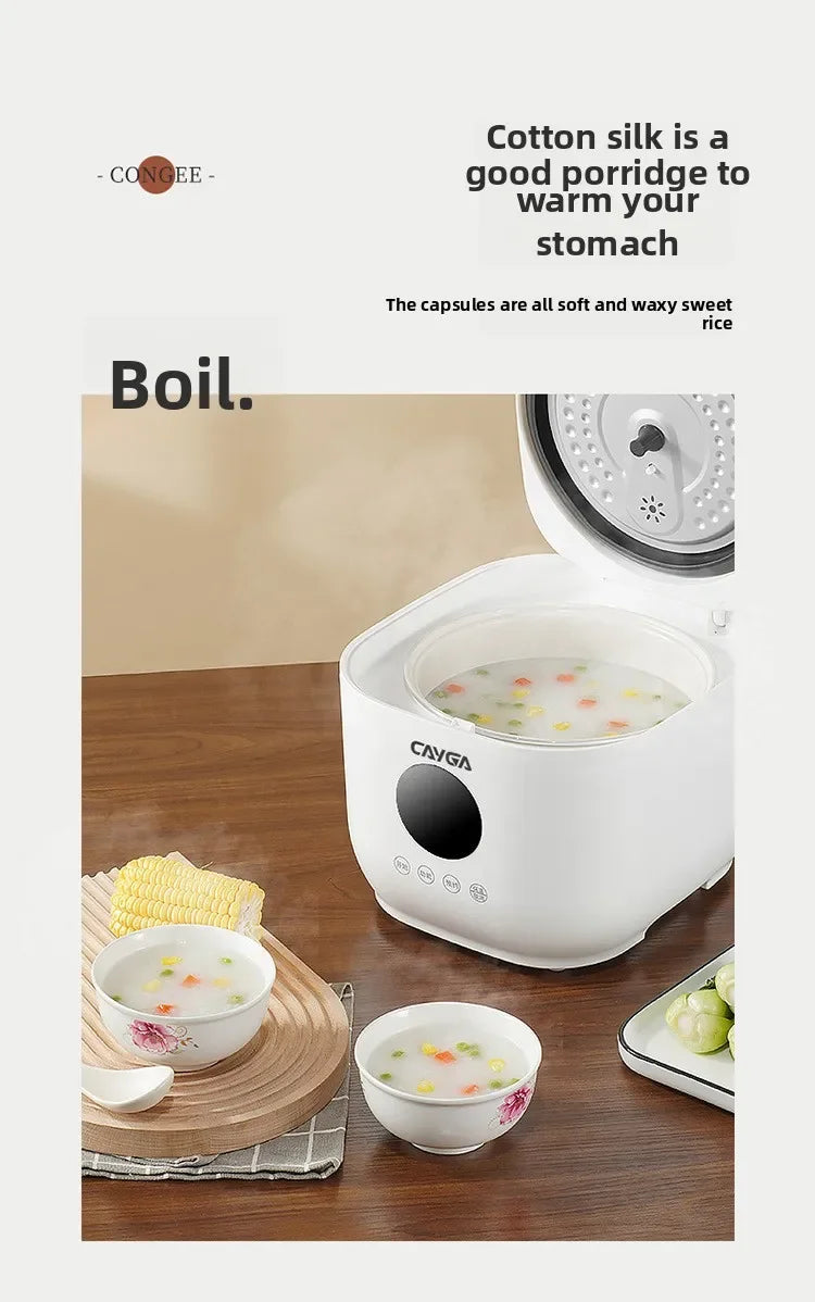 White rice cooker making warm porridge, steaming inside an inner bowl