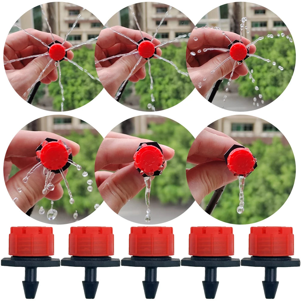 Red adjustable drip nozzles with water spray, shown in a hand-held set of drippers