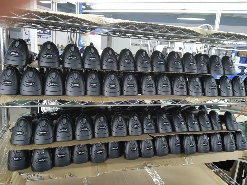 Display rack with many black handheld barcode scanners for store inventory