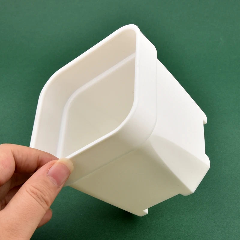 White square plant pot, angled view with open top and inner basin