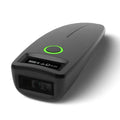 Close-up of a black handheld 2D barcode scanner with green power button ring.