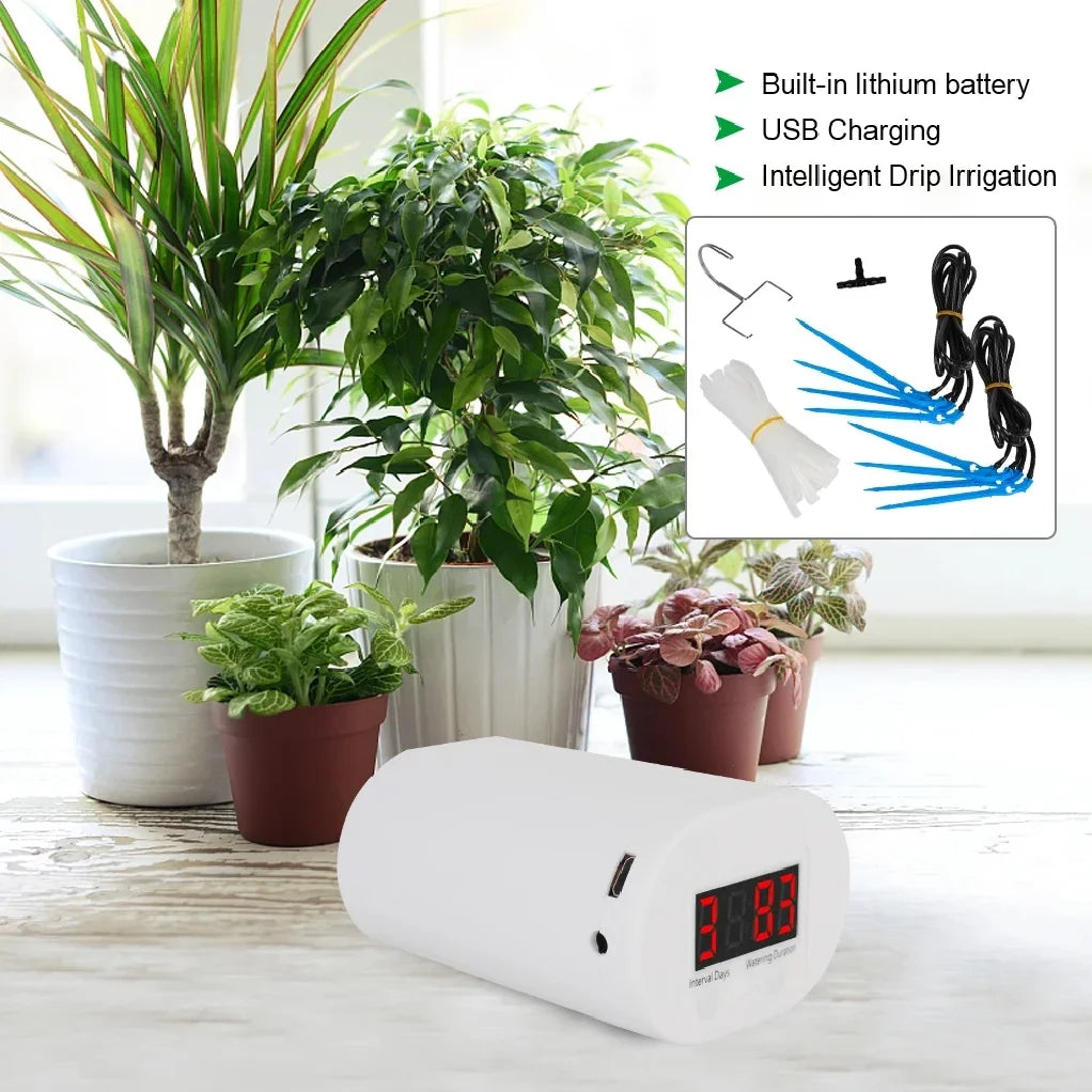 White automatic watering timer device with digital screen on tabletop among potted plants