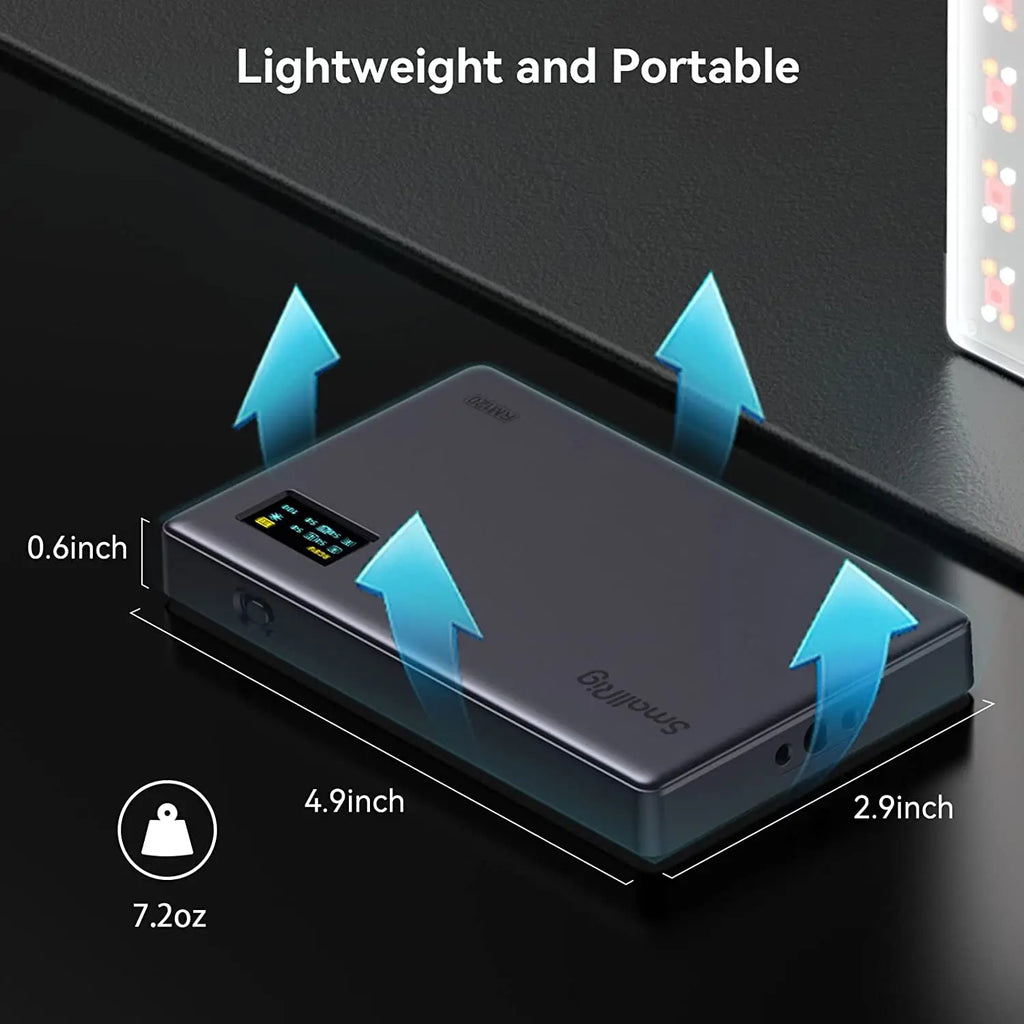 Small, rectangular grey portable LED video light with a built-in display screen, weighing 7.2oz.