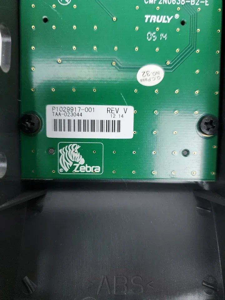 Zebra ZT230 circuit board close-up with serial label P1029917-001