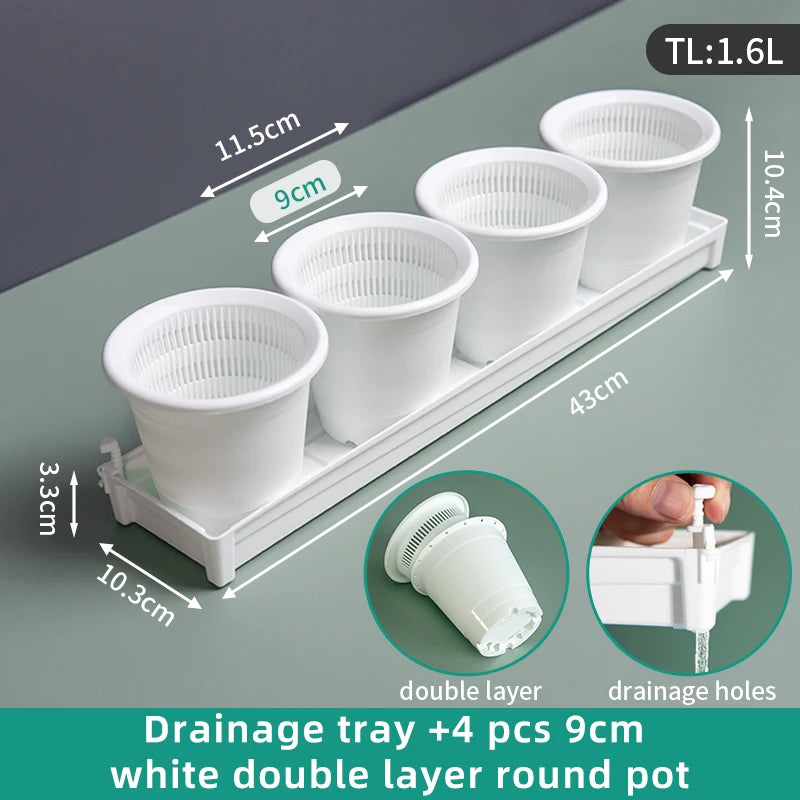 White double-layer drainage tray with four 9 cm round plant pots with drainage holes