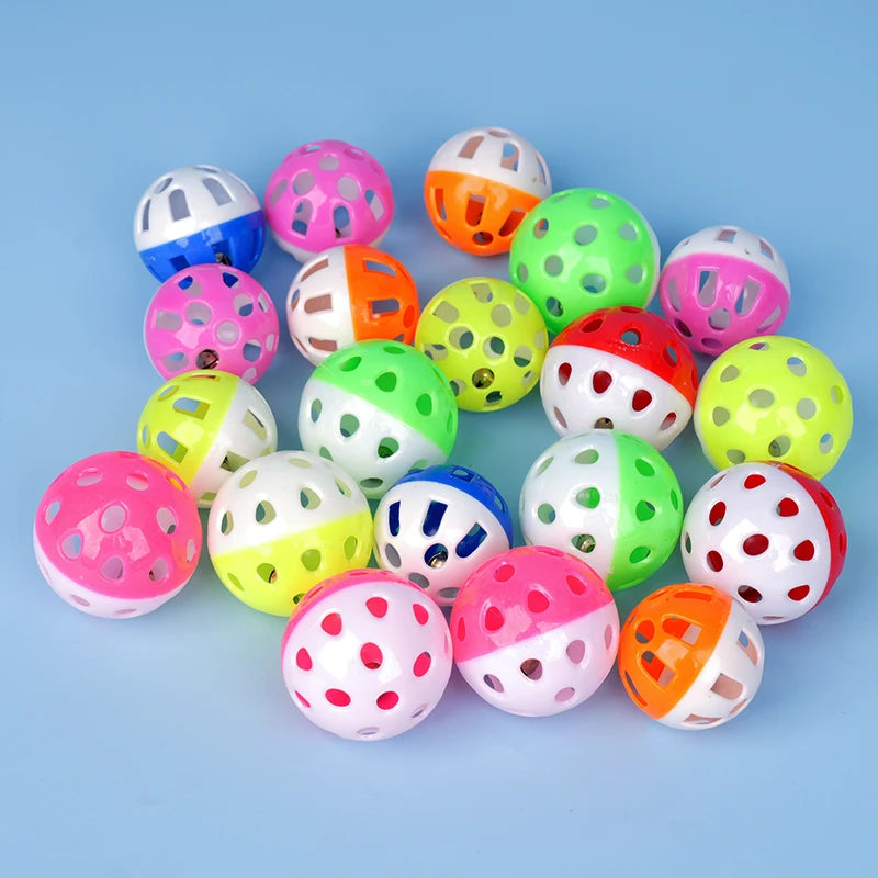 10pcs colorful hollow plastic bell balls for pet parrots, parakeets, and cockatiels to chew, play, and exercise in cages.