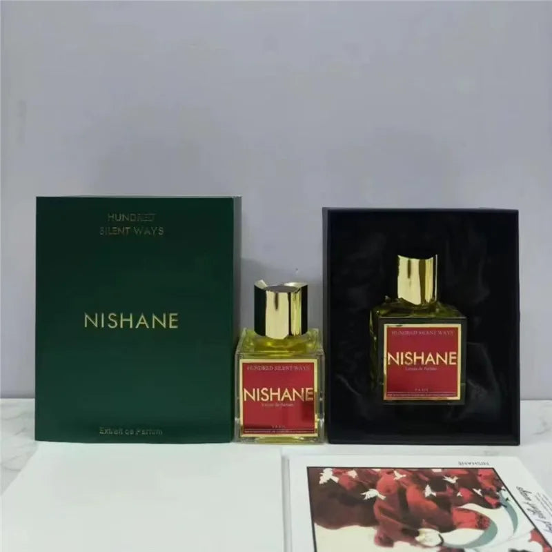 Nishane Hundred Silent Ways Extrait de Parfum. Unisex gold-cap square bottle with red label and green gift box. 100ml.