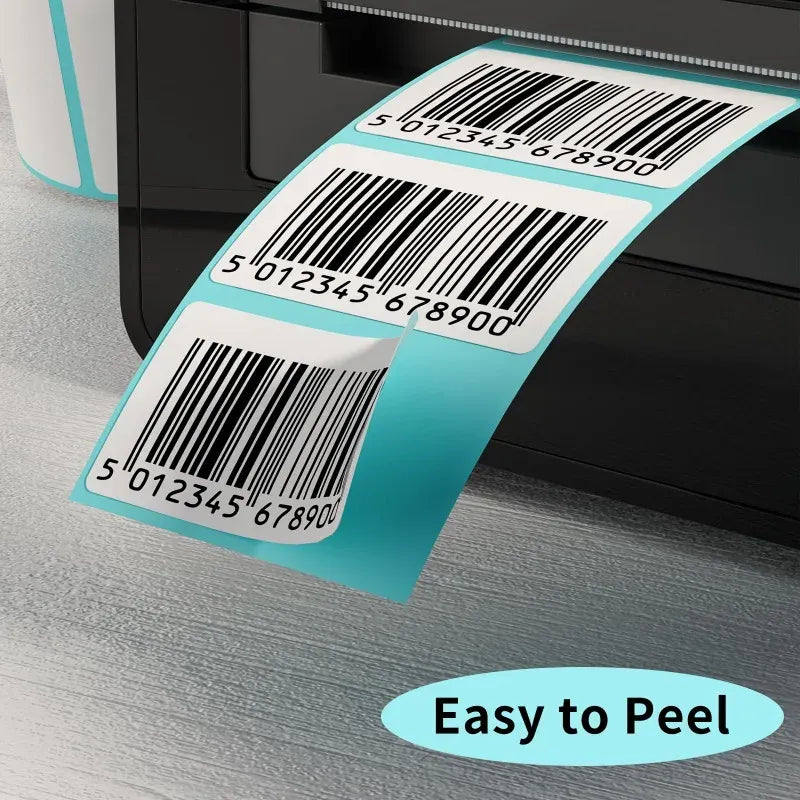 White thermal barcode label sheet on a dark printer, featuring multiple barcode strips