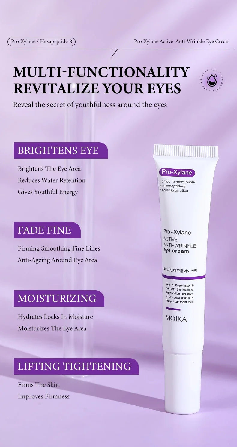 Pro-Xylane anti-wrinkle eye cream in a white squeeze tube against a purple background, for firming and dark circles.