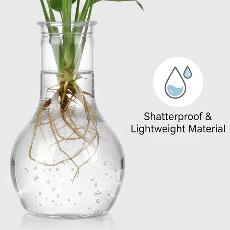 Bulb-shaped hydroponic vase with leafy plant, exposed roots, and water droplets