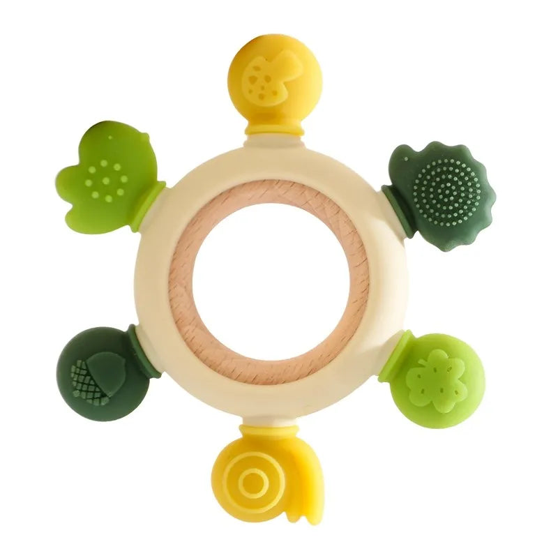 Green and yellow silicone and wood baby teething ring toy for infant soothing.