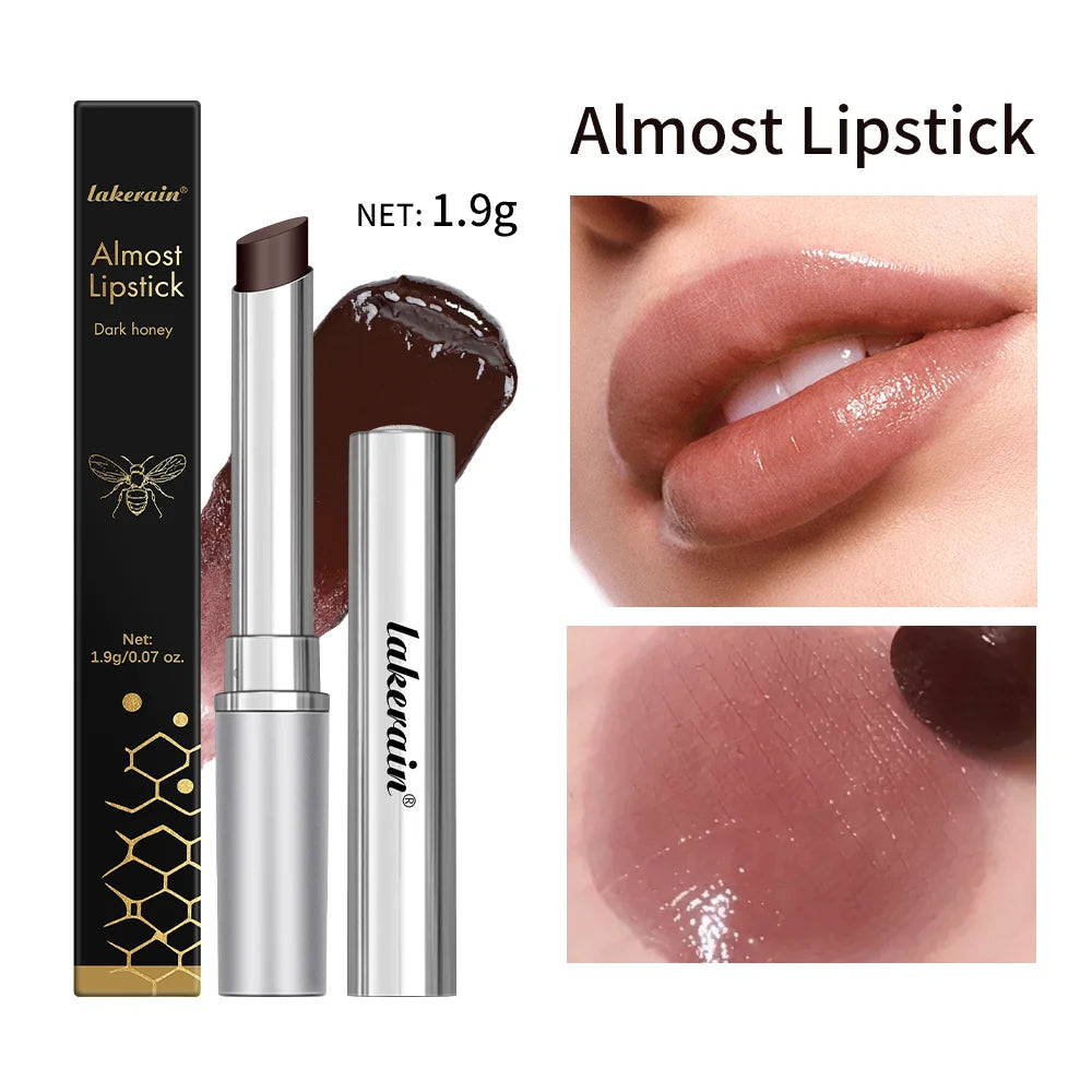 Lakerain Dark Honey tinted lipstick balm for glossy, nourishing lip makeup with a sheer brown-black finish.