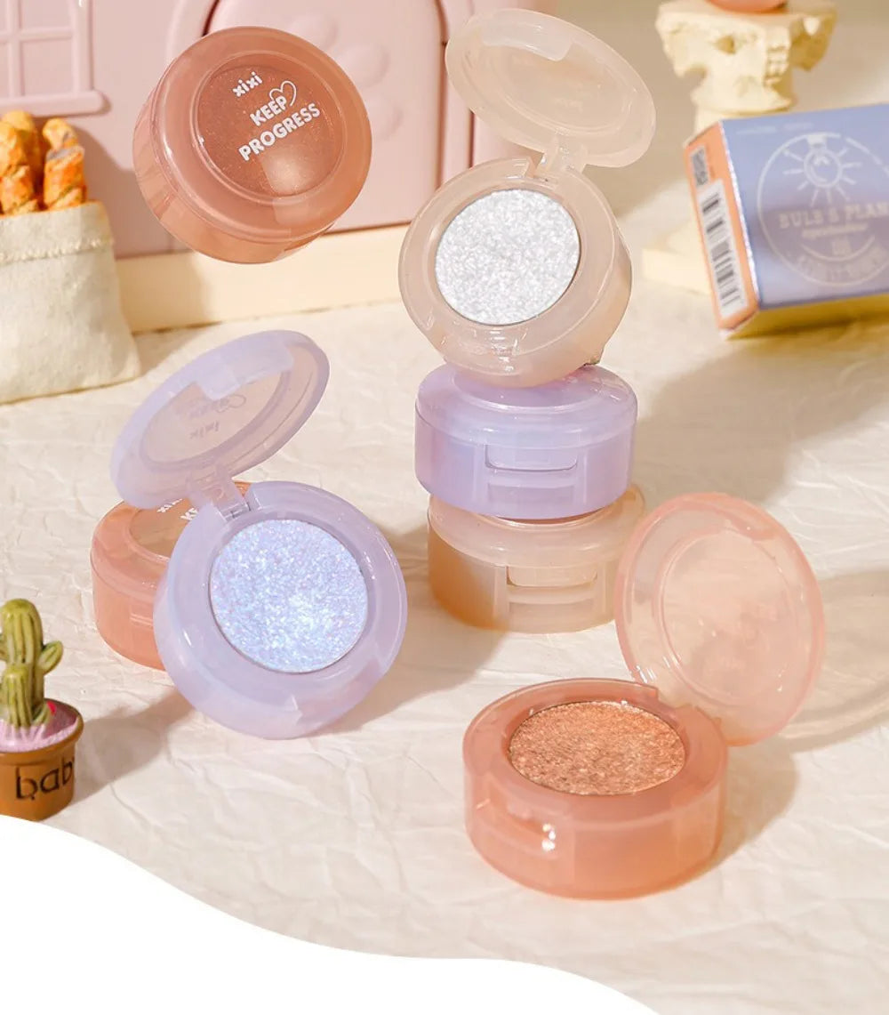 Tidesmit monochrome glitter eyeshadow and shimmering highlighter powder texture close-up for waterproof face makeup