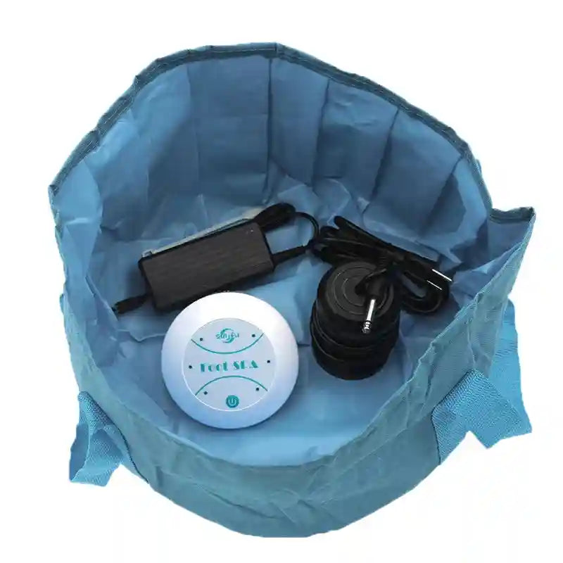 Ionic foot detox spa kit with round controller, black array, and power adapter in a collapsible blue foot bath basin.