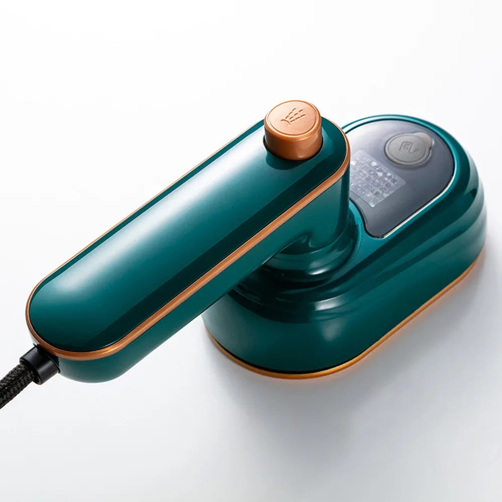 Tidesmit portable handheld mini garment steamer for dry and wet ironing of clothes, side angle view.