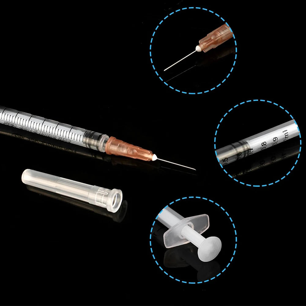 100pcs 1ml plastic syringes with needles for precise pet feeding, lab use, and industrial liquid distribution.