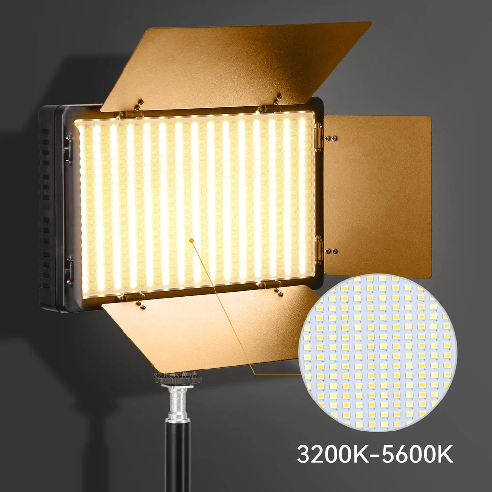 Rectangular LED video light with metal barn doors on a stand, featuring adjustable color temperature from 3200K to