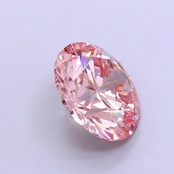 Oval pink diamond gemstone viewed from the side