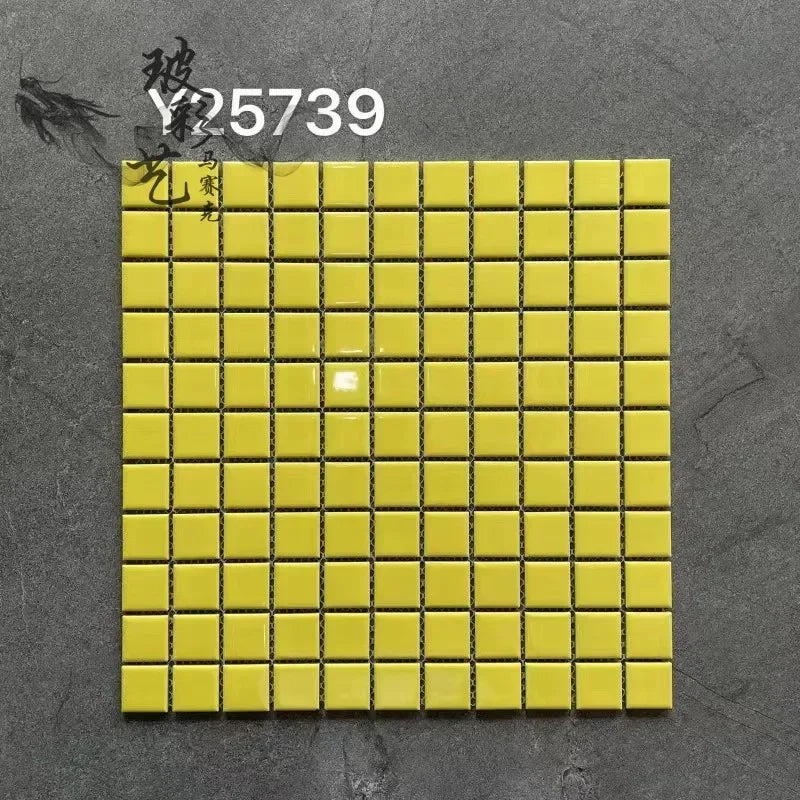 Ceramic mosaic wall tiles sheet with glossy yellow squares and dark grout lines