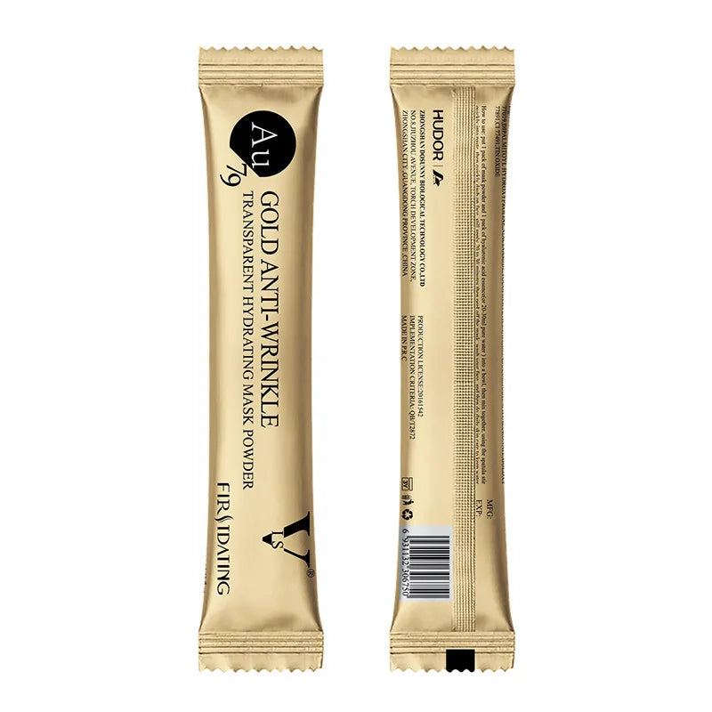 Two metallic gold single-use packets of anti-wrinkle mask powder, showing front and back views with black text.