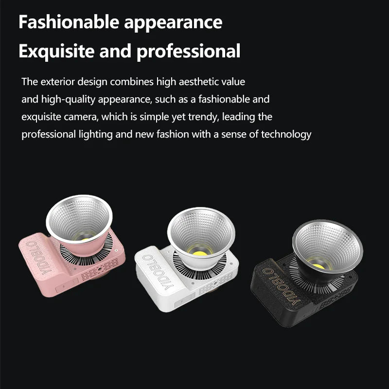 Three portable, square LED studio lights in pink, white, and black with prominent circular reflectors for photography.