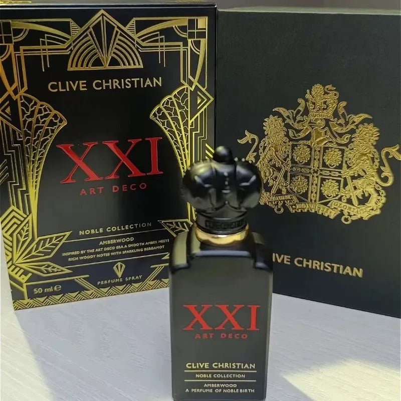 Clive Christian XXI Art Deco Amberwood perfume. Matte black rectangular bottle with crown cap and matching display box.