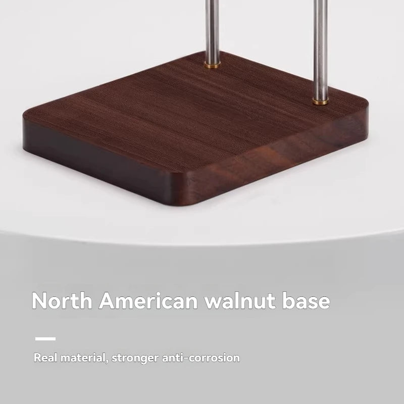 Coffee dripper stand with premium North American walnut wood base and stainless steel support rods for pour-over brew.