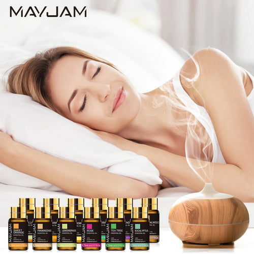 MAYJAM essential oil set and wood grain diffuser for aromatherapy wellness, featuring various plant scents.