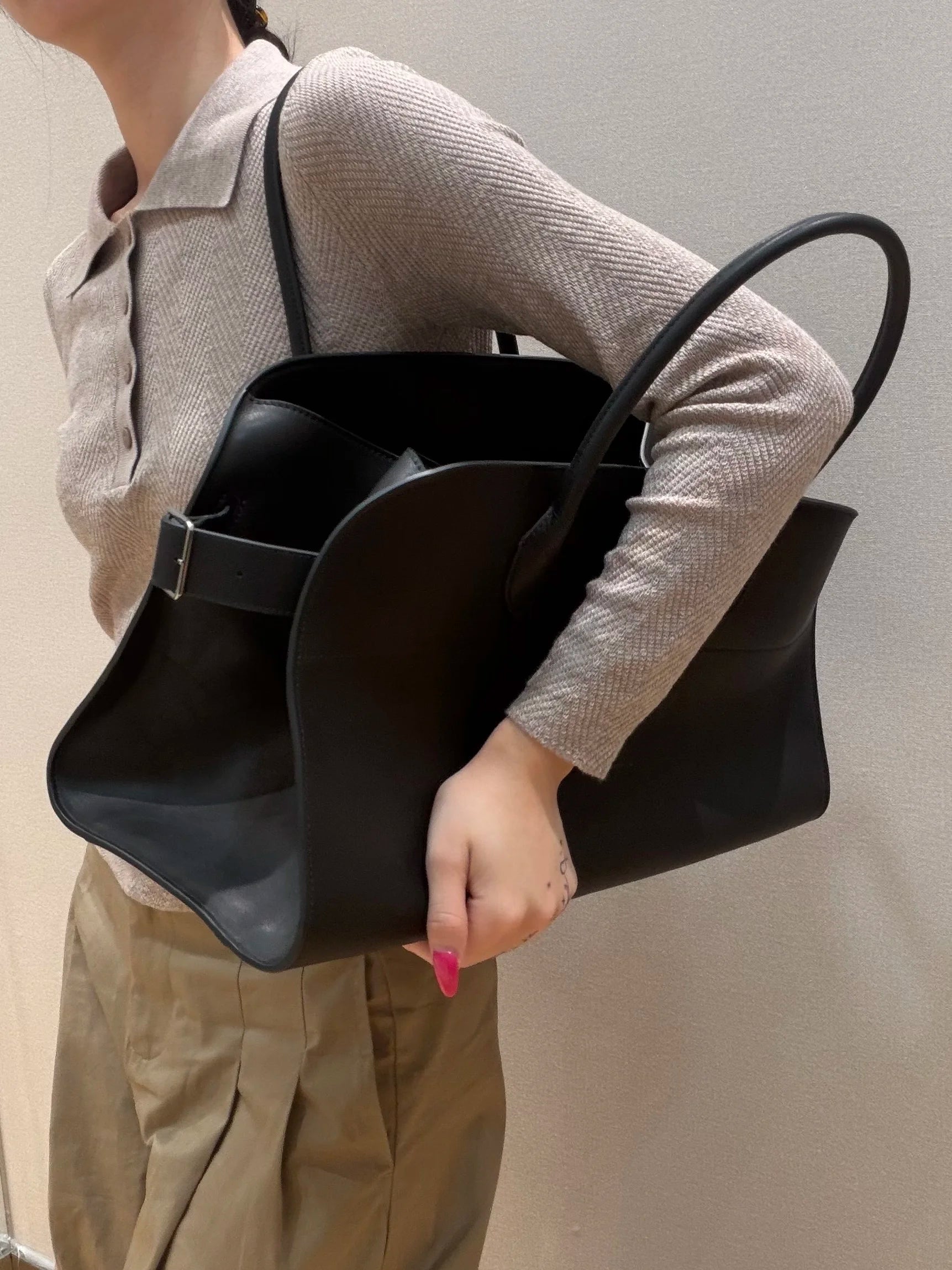 Unisex saddle leather all steel hardware inner sheepskin single shoulder large capacity hand-held horizontal bag