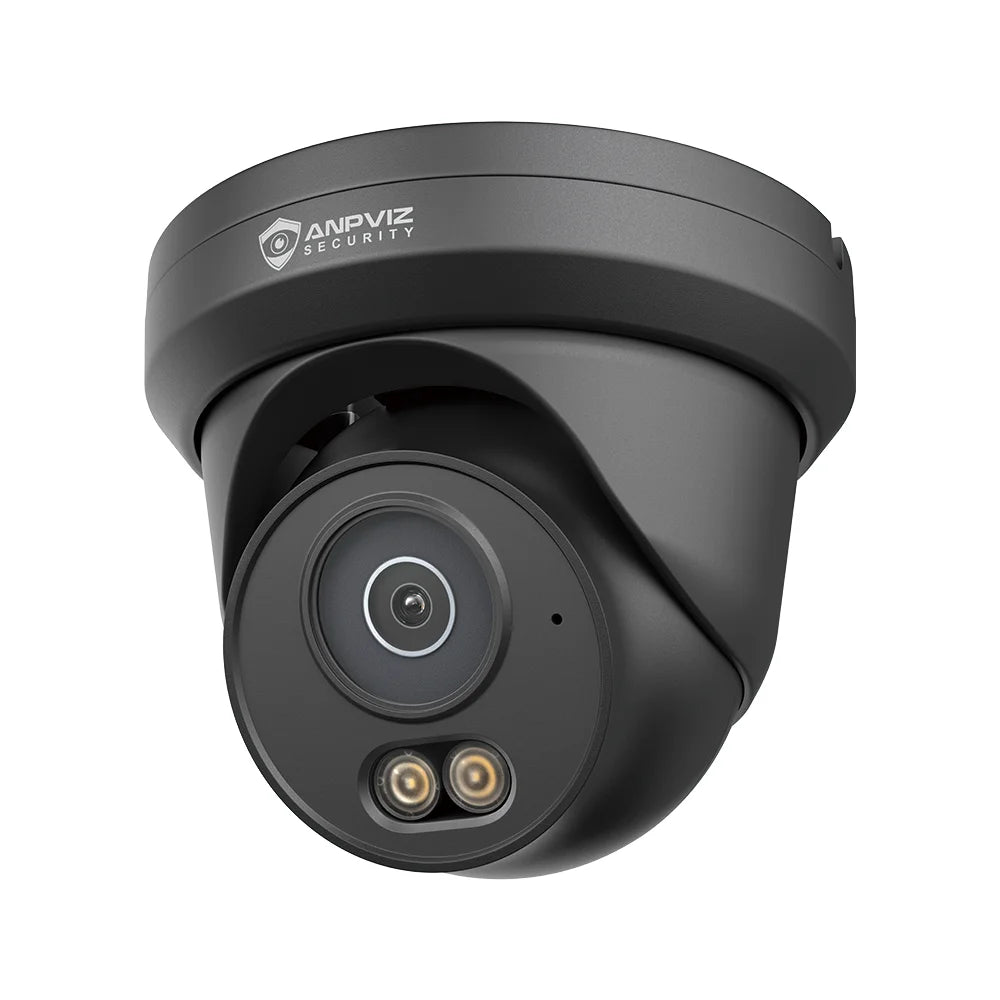 Black turret security camera close-up with lens and dual light emitters