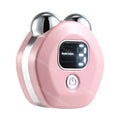 Pink portable facial massager with two silver roller heads, a digital display, and a power button.