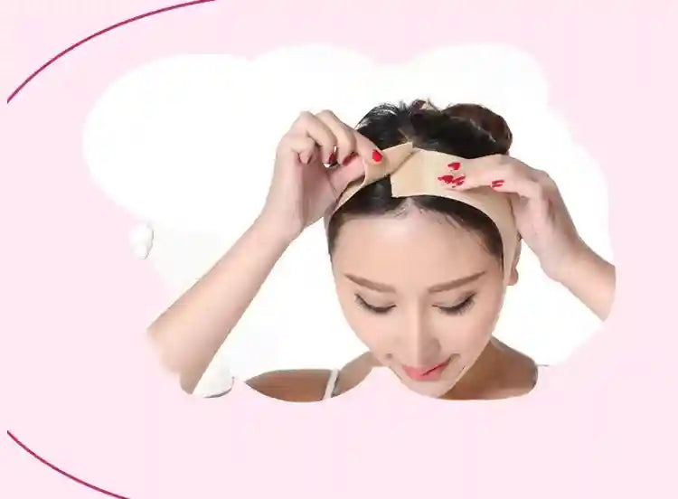 A woman adjusts a beige, elastic V-line face slimming bandage with velcro straps around her chin and head.