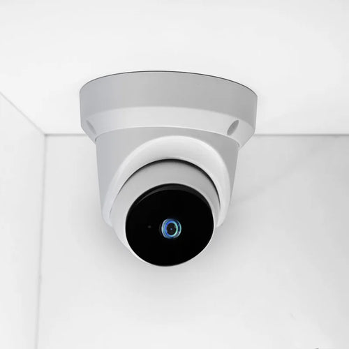 Indoor dome Wi‑Fi security camera, white ceiling-mount with black lens module