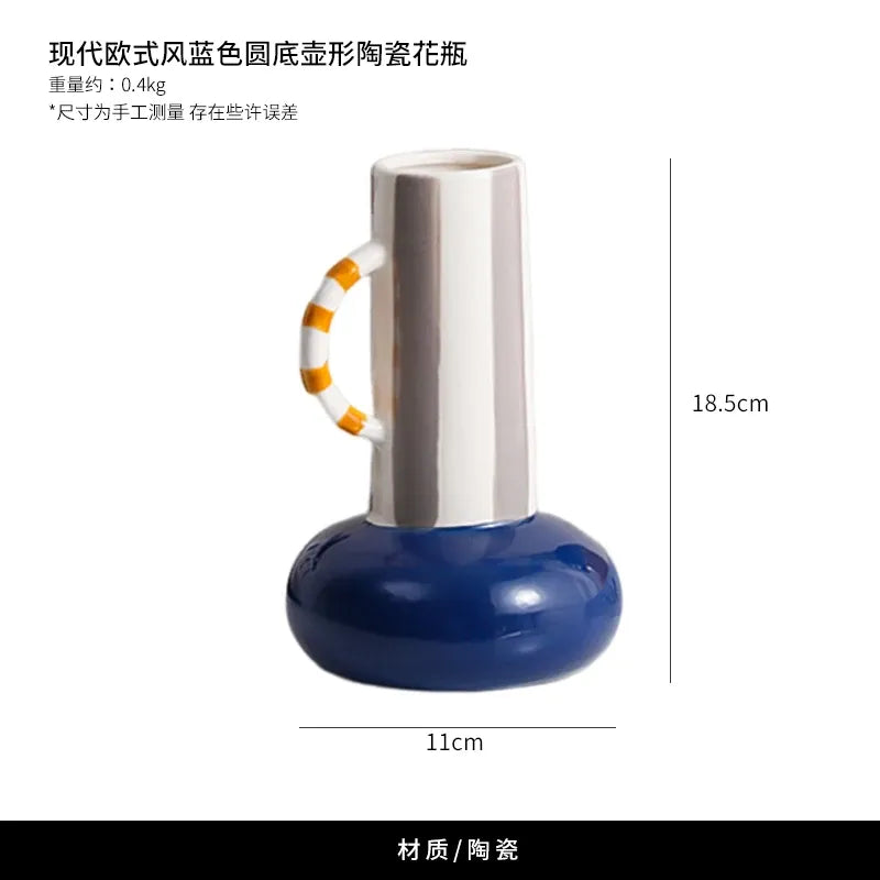 Blue-and-orange pot-shaped ceramic vase with silver neck, side view