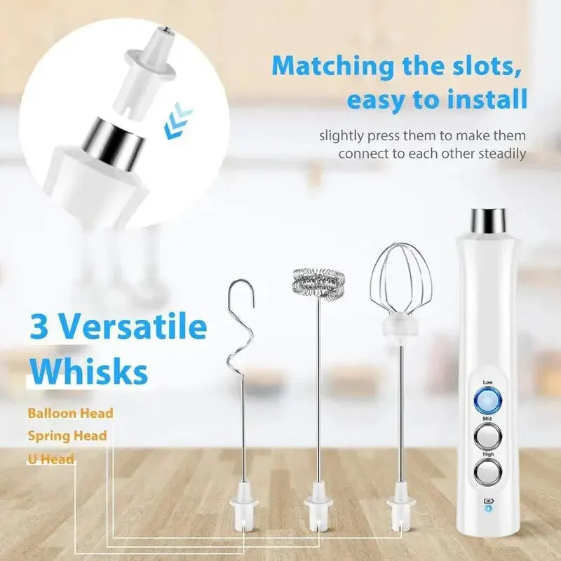 White electric handheld milk frother with 3 interchangeable stainless steel whisk heads and 3-speed settings.