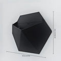 Black hexagonal wall planter, 16.5cm wide and 14.5cm tall, open top with mounting holes.